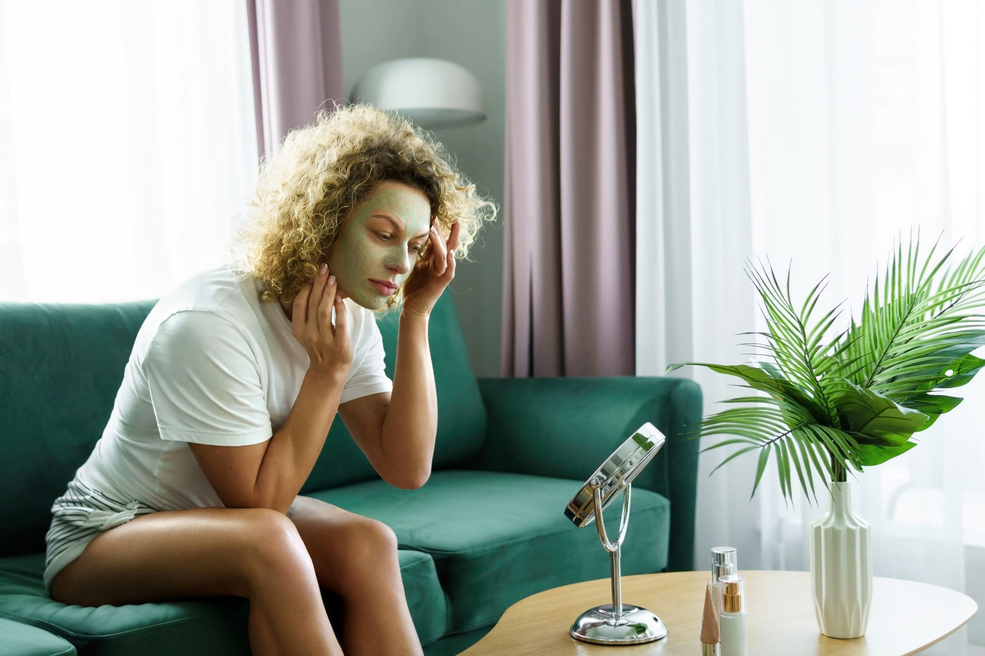 beautiful-woman-is-applying-exfoliating-and-cleanser-Exfoliating Masks