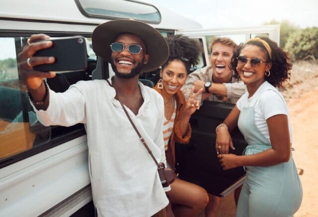 friends-selfie-road-trip-desert-and-smile-on-travel