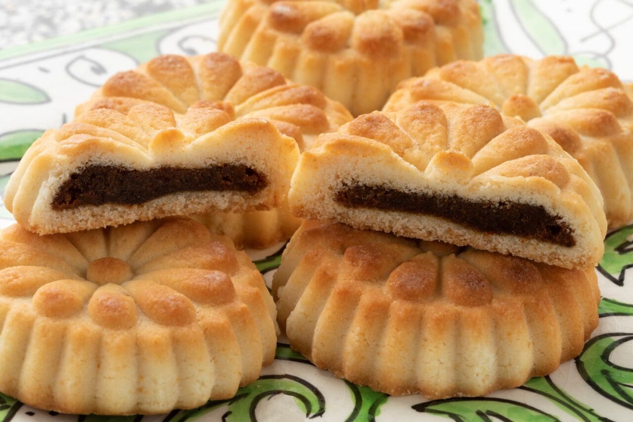 Traditional fresh baked Maamoul cookies stuffed with dates and cardamom close up