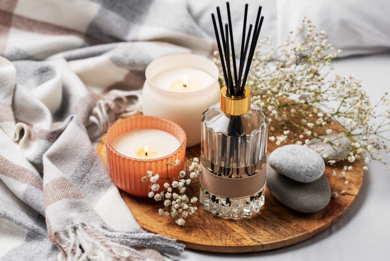 Cozy home atmosphere. Home liquid fragrance in glass bottle